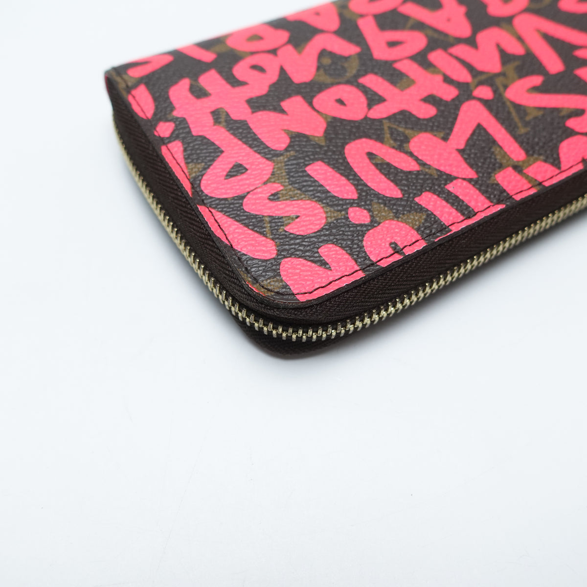 Pre-Owned Louis Vuitton Zipper Pink Canvas Wallet T10468632