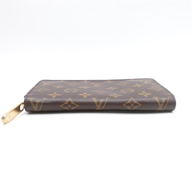 Pre-owned Louis Vuitton Brown Monogram Canvas Zippy wallet