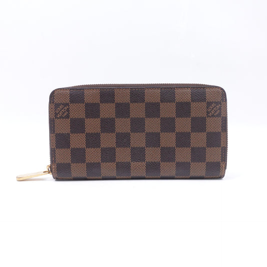 Pre-owned Louis Vuitton Zippy Damier Ebene Coated Canvas Wallet